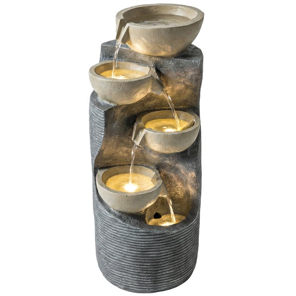 Kaskadenbrunnen mit vier beleuchteten Schalen in Natursteinoptik.