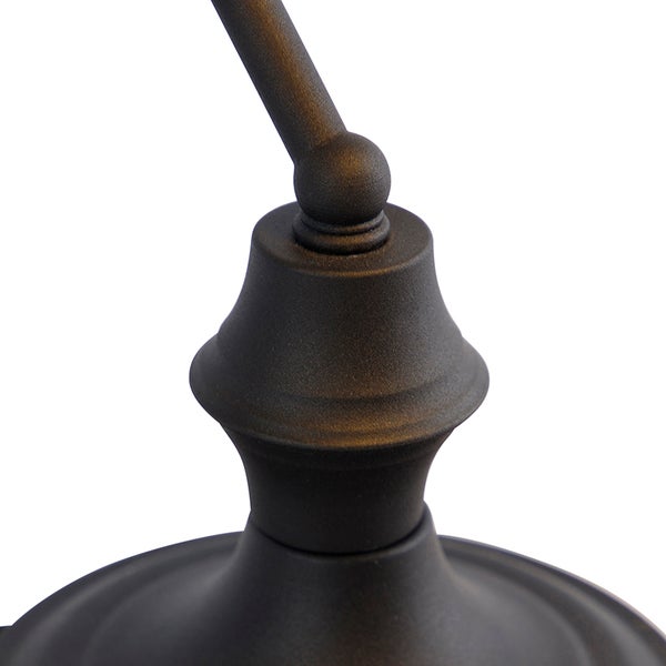 Detailaufnahme einer schwarzen Leuchtenhalterung mit Arm