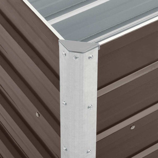 Nahaufnahme der Ecke eines Hochbeets aus Metall mit Wellblechpaneelen und verschraubtem Eckprofil.