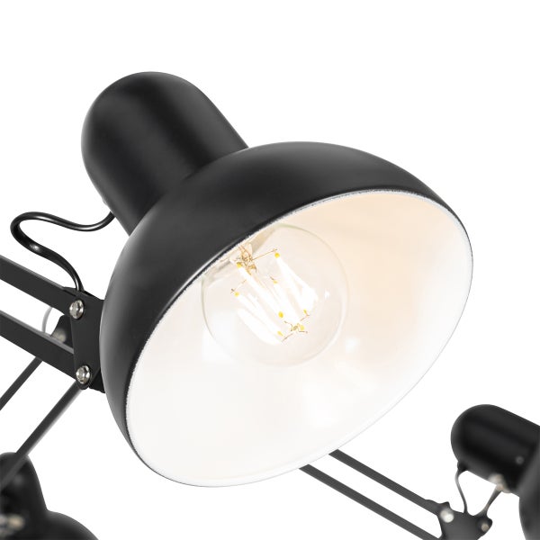 Schwarze Schreibtischlampe mit Glühbirne