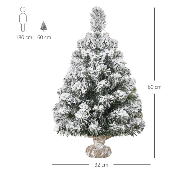 Künstlicher kleiner Weihnachtsbaum mit Schneeeffekt und Jutesockel. Höhe 60 Zentimeter, Breite 32 Zentimeter.