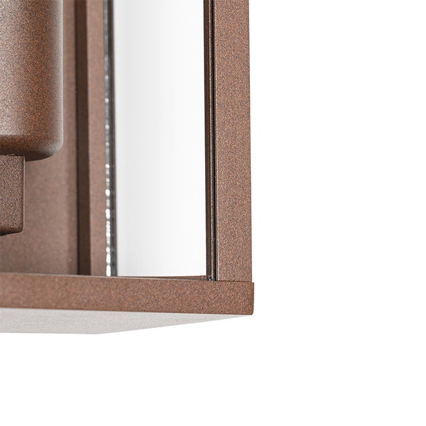 Detailansicht einer Außenwandleuchte mit strukturiertem braunem Metallrahmen und Glaseinsatz.