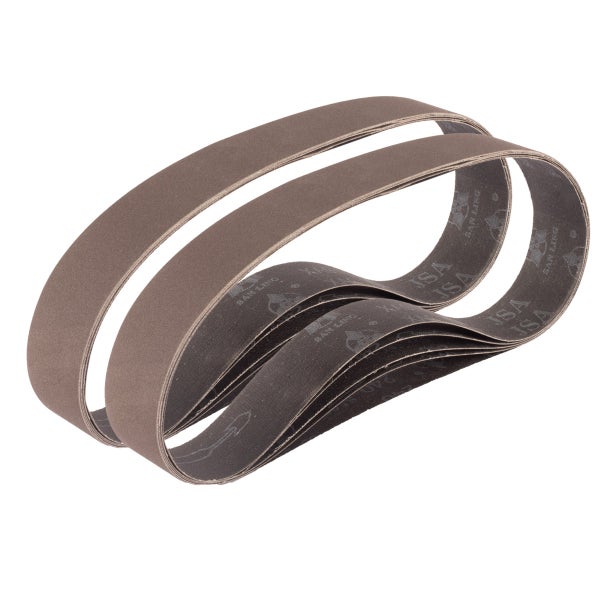 Wohnzimmer mit blauem Sofa, Holztisch und einer Fototapete mit Mondmotiv für eine gemütliche Atmosphäre