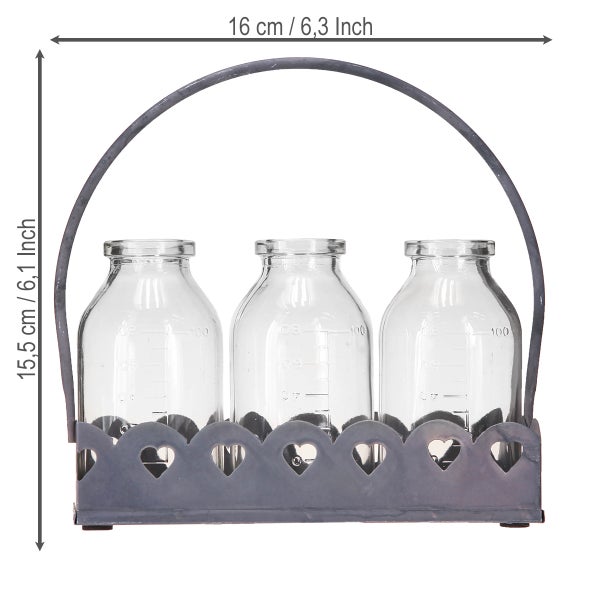 Dekorative Flaschen im Metallständer mit Herzdesign