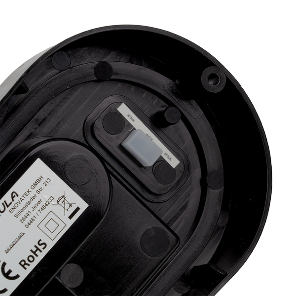 Detailansicht der Unterseite einer Leuchte mit Schalter zur Einstellung der Farbtemperatur.