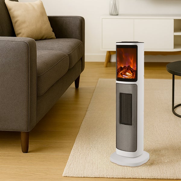Zimmeransicht mit einem Turm-Elektroheizer mit simuliertem Kaminfeuer.