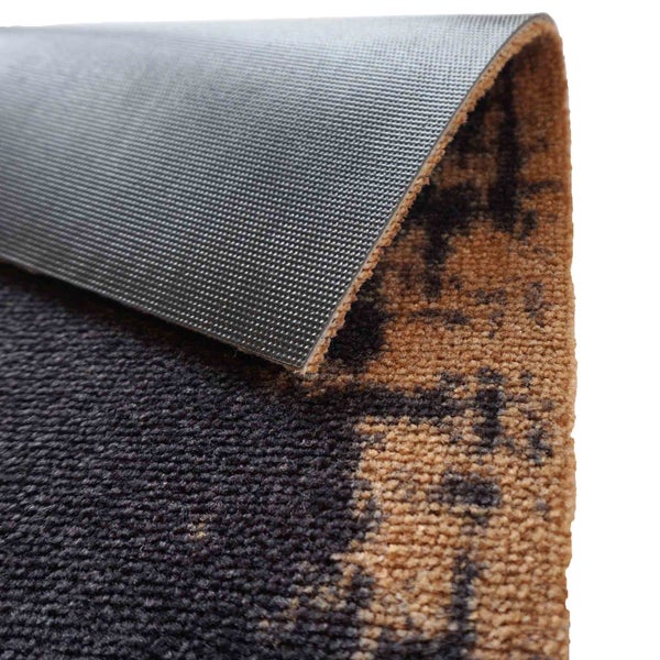 Detailansicht einer Teppichunterseite mit Rückenbeschichtung