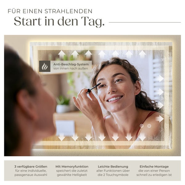 Frau vor einem beleuchteten Spiegel mit Antibeschlagsystem, Memoryfunktion, Touchbedienung und einfacher Montage für einen strahlenden Start in den Tag.
