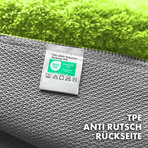Detailansicht eines Teppichs mit Flor aus 100 Prozent Polyester und TPE-Rückseite mit Antirutschbeschichtung sowie Öko-Tex Standard 100 Siegel