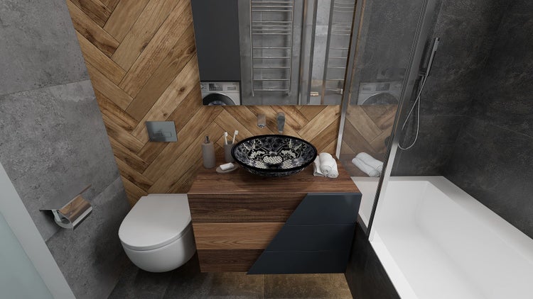 Modernes Badezimmer mit Waschbecken, Toilette und Badewanne.