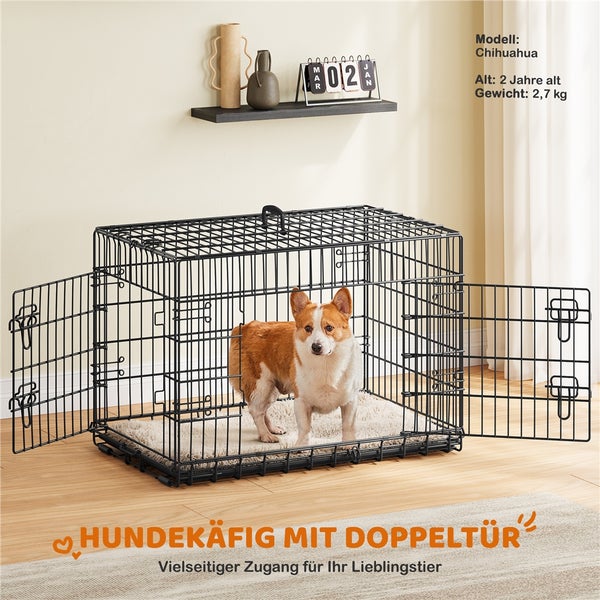 Schwarzer Hundekäfig mit Doppeltür und Hund