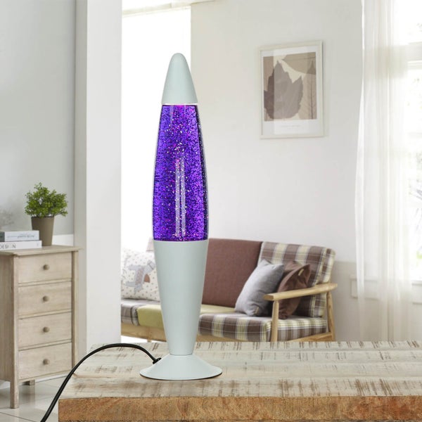 Dekorative Lavalampe mit violettem Glitzer auf einem Holztisch