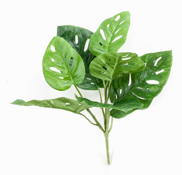 Künstliches grünes Monstera-Blatt mit charakteristischen Löchern, detailreiche Nachbildung für die Dekoration.