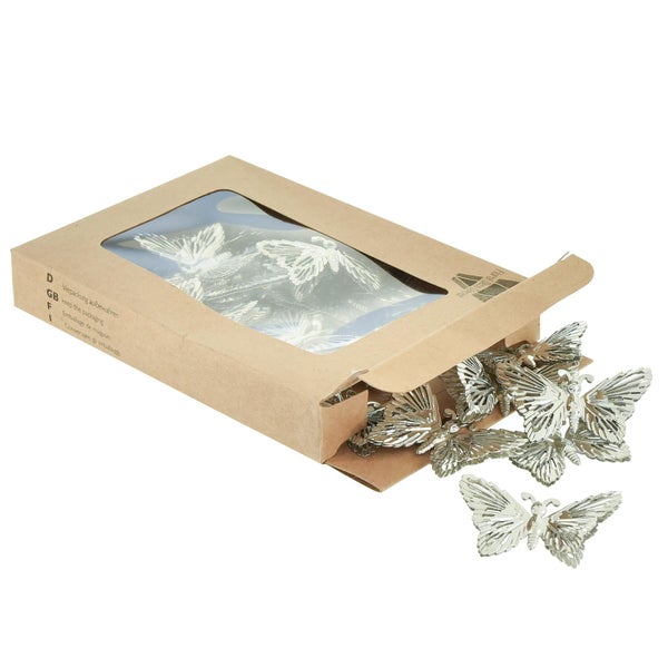 Dekorative Schmetterlinge in einer Verpackung