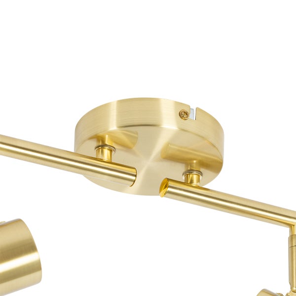 Detailaufnahme einer Deckenleuchte mit Montageplatte und Lampenarmen