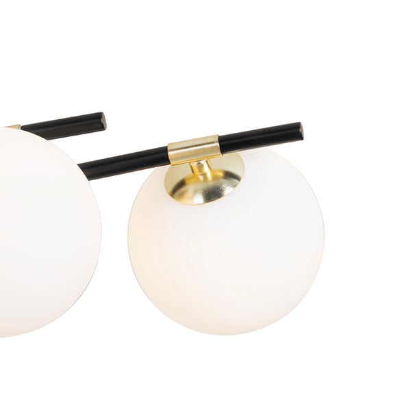 Deckenleuchte mit runden Lampenschirmen an schwarzem Metallgestell