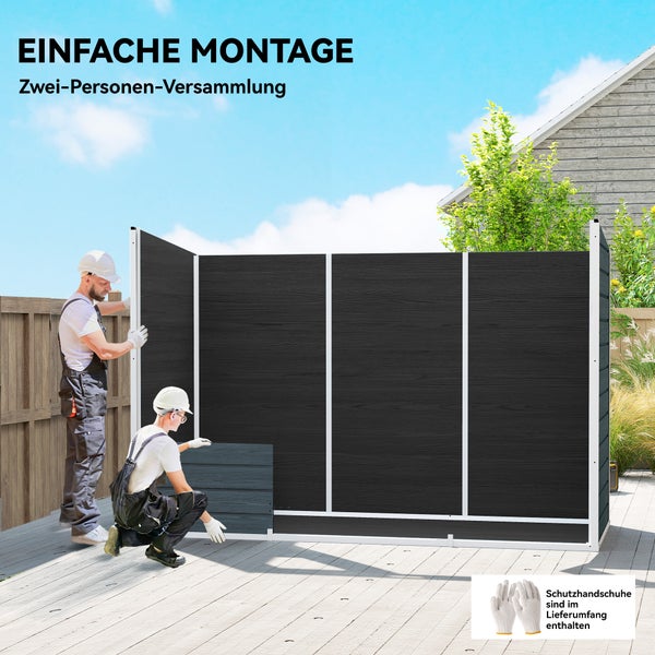 Zwei Personen montieren ein dunkelgraues Gartenhaus auf einer hellen Holzterrasse. Schutzhandschuhe sind im Lieferumfang enthalten.