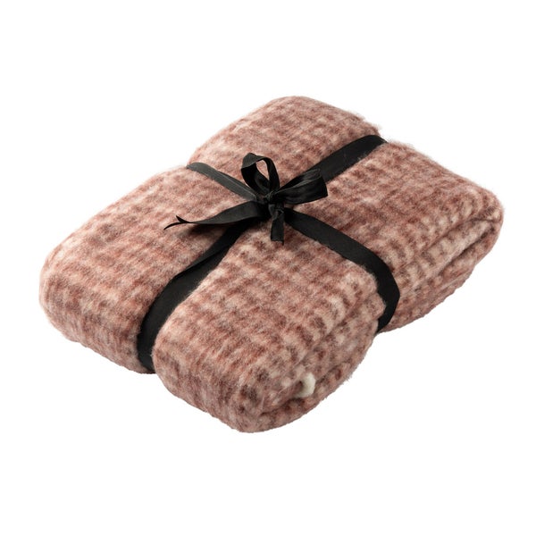 Zusammengefaltete Decke mit Schleife