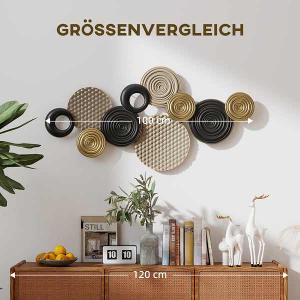 Wanddekoration mit Kreismotiven in Gold und Schwarz, zur Größenveranschaulichung auf einem Sideboard platziert.