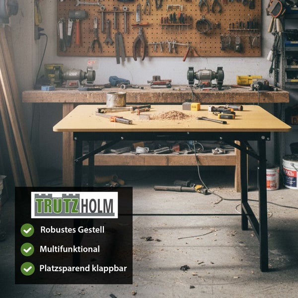Trutzholm klappbare Werkbank mit robustem schwarzem Gestell und heller Holzplatte in einer Werkstatt mit Werkzeugwand. Trutzholm Logo.