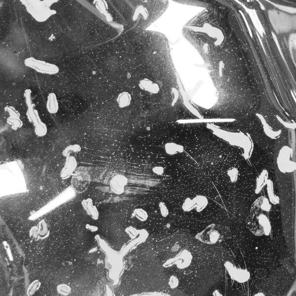 Abstrakte Darstellung einer transparenten Folie mit Flecken