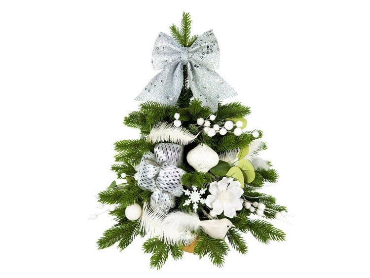 Geschmückter künstlicher kleiner Weihnachtsbaum mit Schleifen, Kugeln und Dekoblumen