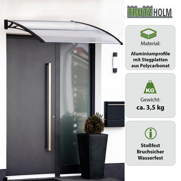 Trutzholm Haustürvordach mit Aluminiumprofilen und Polycarbonat Stegplatten montiert über einer modernen Eingangstür.