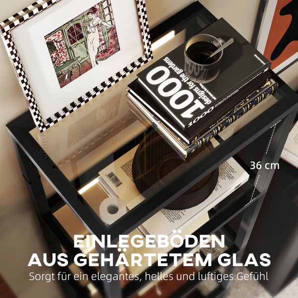Schwarzes Regal mit Einlegeböden aus gehärtetem Glas, modern dekoriert mit Büchern und einem Bilderrahmen, helle und luftige Atmosphäre.