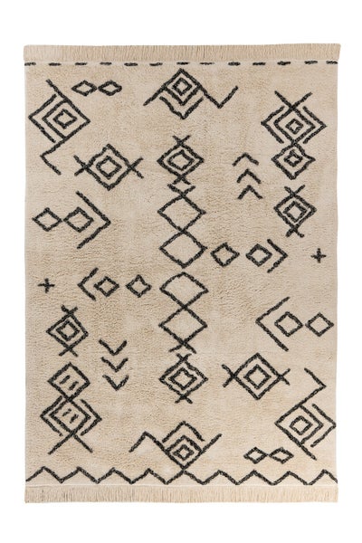 Beiger Hochflor-Teppich mit schwarzen geometrischen Mustern und Fransen.