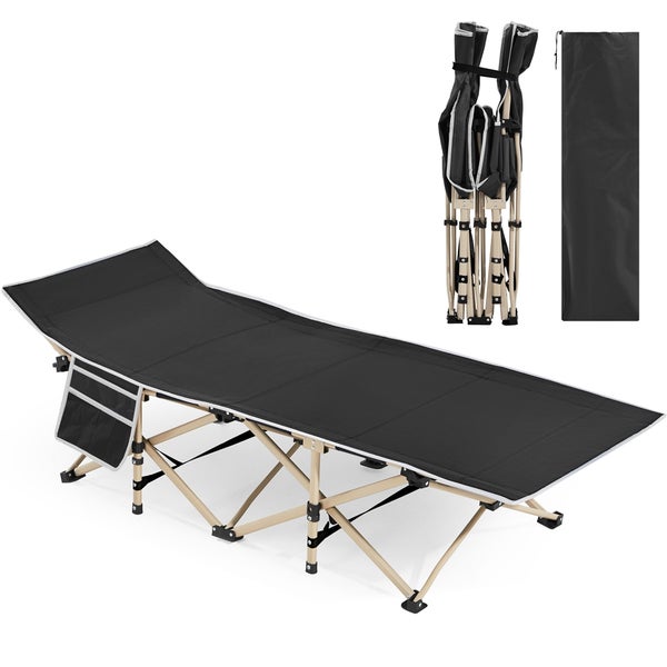 Feldbett mit Taschen und Packsack