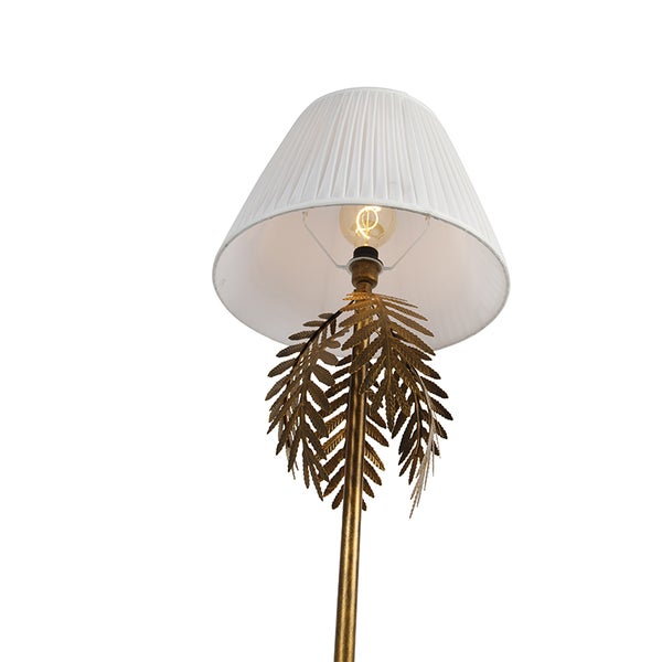 Stehlampe mit Lampenschirm und dekorativem Blattdetail