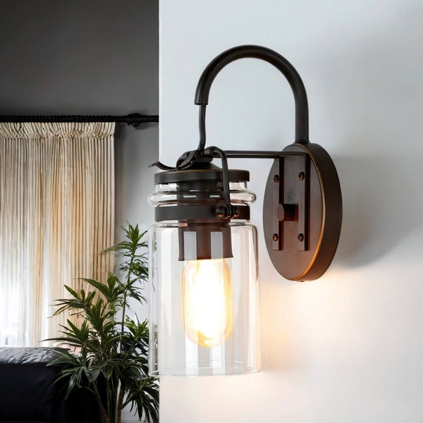 Wandleuchte mit klarem Glas und Metallbefestigung
