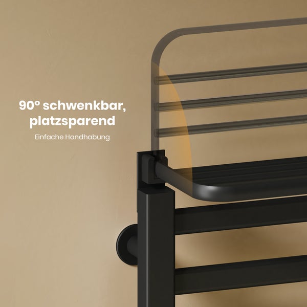Schwarzer Handtuchheizkörper mit einer um 90 Grad schwenkbaren, platzsparenden Ablage.