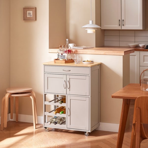Servierwagen mit Schublade, Schrankfächern und Weinregal in einer hellen Küche