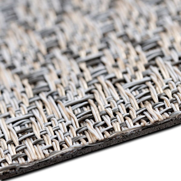 Detailaufnahme eines gewebten Teppichs mit strukturierter Oberfläche