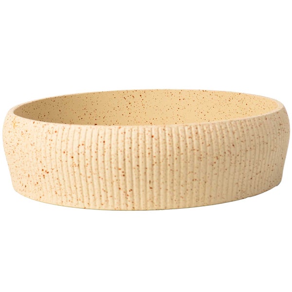 Rundes Aufsatzwaschbecken aus Keramik mit geriffelter Außenseite und gesprenkeltem Design.