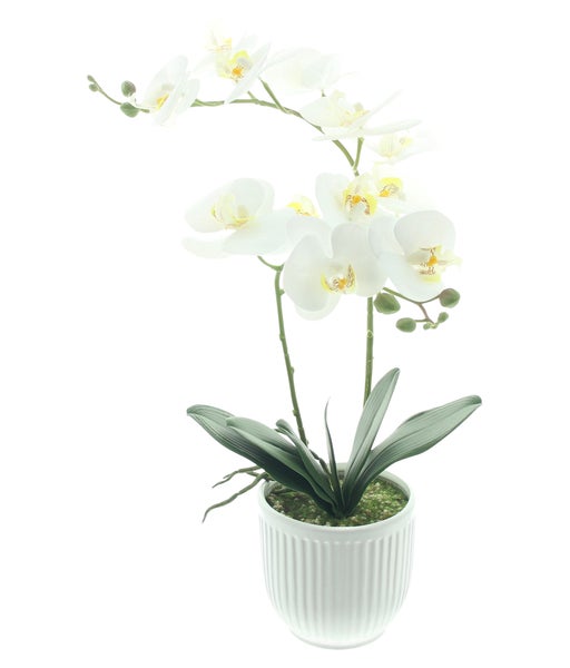 Künstliche Orchidee in weißem Topf