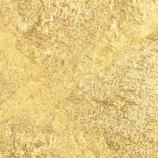 Strukturierte Oberfläche mit Gold-Effekt und metallischem Glanz.
