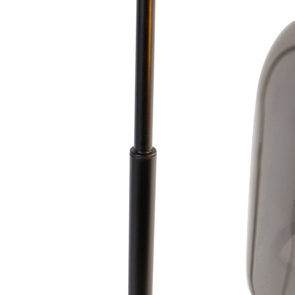 Nahaufnahme einer schwarzen, höhenverstellbaren Teleskopstange aus Metall.