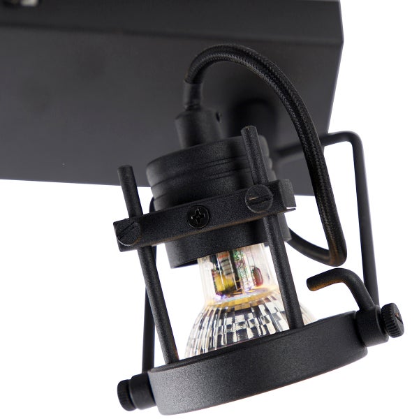 Schwarzer Deckenstrahler mit einem Lampenkopf.