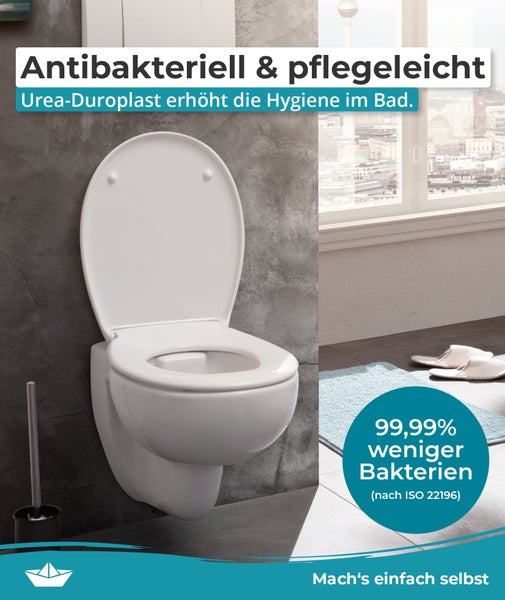 Wandhänge WC aus pflegeleichtem antibakteriellem Urea Duroplast in modernem Badezimmer.