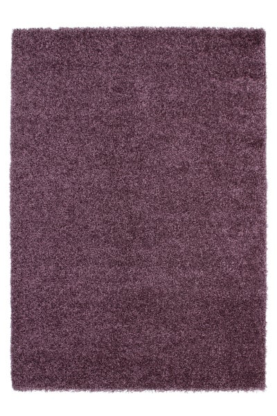 Rechteckiger Hochflor Teppich mit weicher Struktur für Wohnbereiche.