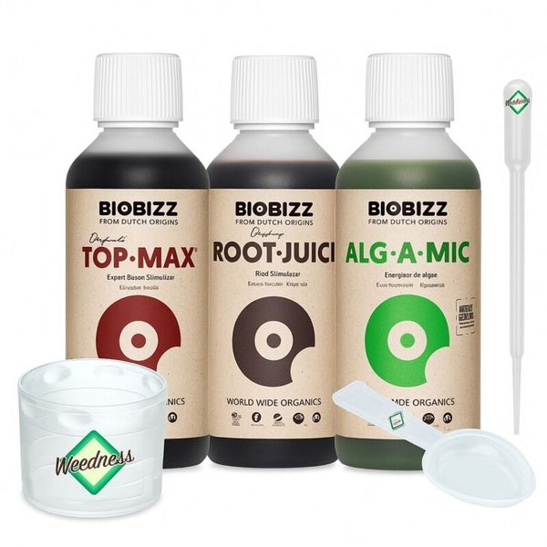 Biobizz Pflanzendünger-Set mit Top Max, Root Juice, Alg A Mic, einem Messbecher, einer Pipette und einem Dosierlöffel.