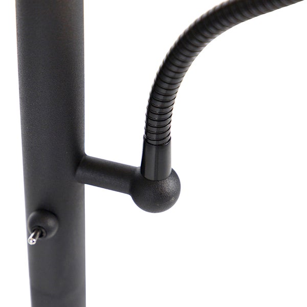 Detailansicht einer schwarzen Leuchte mit einem Kippschalter und einem flexiblen Schwanenhals.