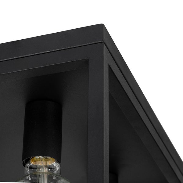 Detailaufnahme einer schwarzen Deckenleuchte mit Glühbirne