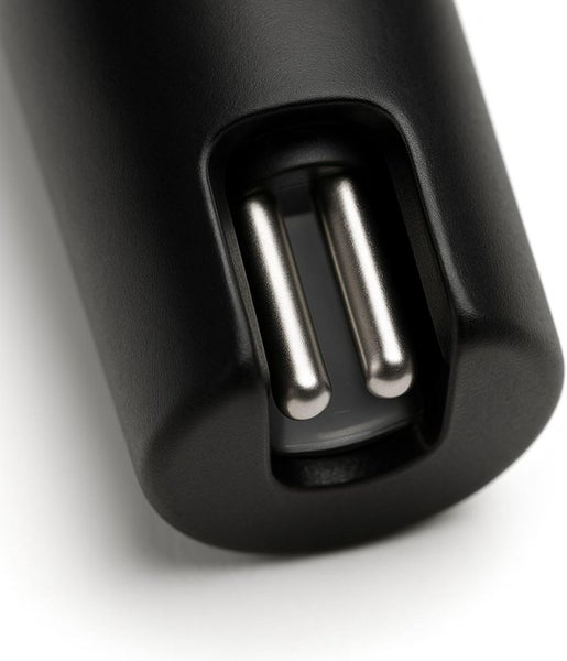 Detailansicht eines Feuchtigkeitsmessgeräts mit zwei Metallstiften in einem schwarzen Kunststoffgehäuse.