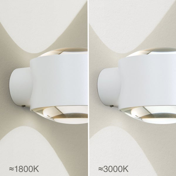 Vergleich der Farbtemperatur einer LED-Wandleuchte zwischen circa 1800 Kelvin und circa 3000 Kelvin.