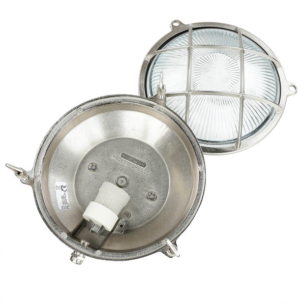 Geöffnete runde Außenleuchte mit Schutzgitter