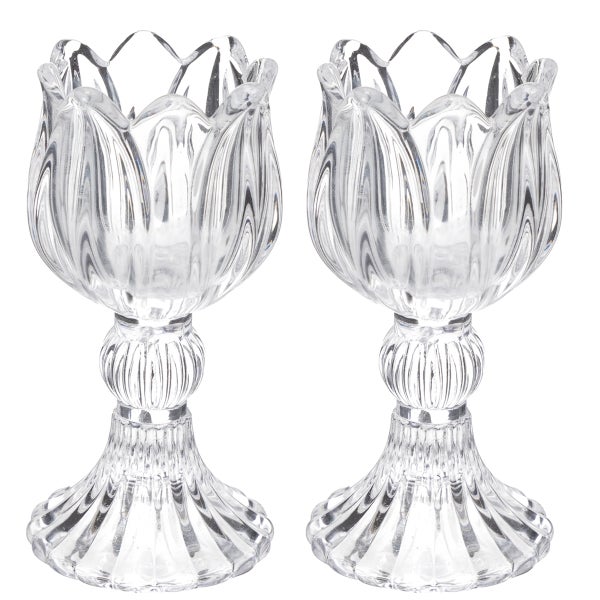 Zwei transparente Teelichthalter aus Glas in Tulpenform mit geriffeltem Stiel.