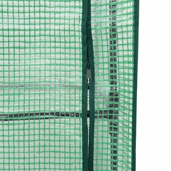 Detail der Gitterfolie eines Gewächshauses mit Reißverschluss.